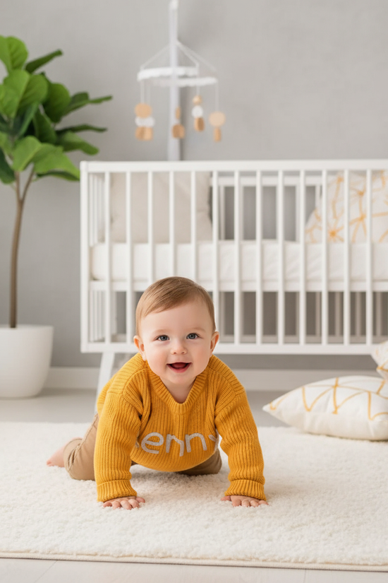 Baby boy crawling in nursery