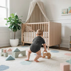 Baby boy in nursery - back view 3