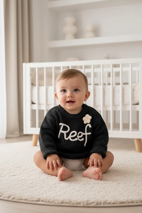Baby boy in nursery - sitting