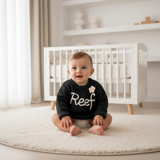 Baby boy in nursery - sitting