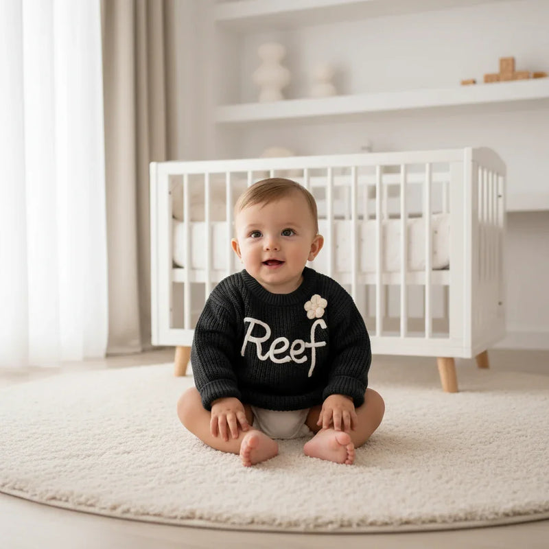 Baby boy in nursery - sitting