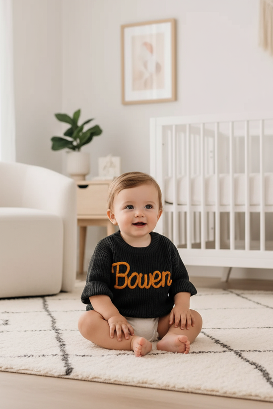 Baby boy in nursery - sitting