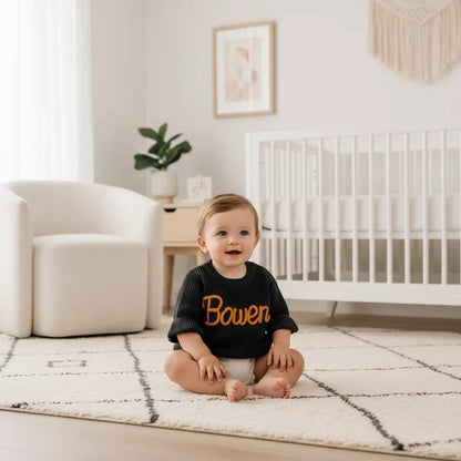 Baby boy in nursery - sitting