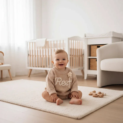 Baby boy in nursery - sitting