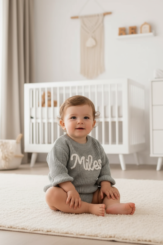 Baby boy in nursery - sitting