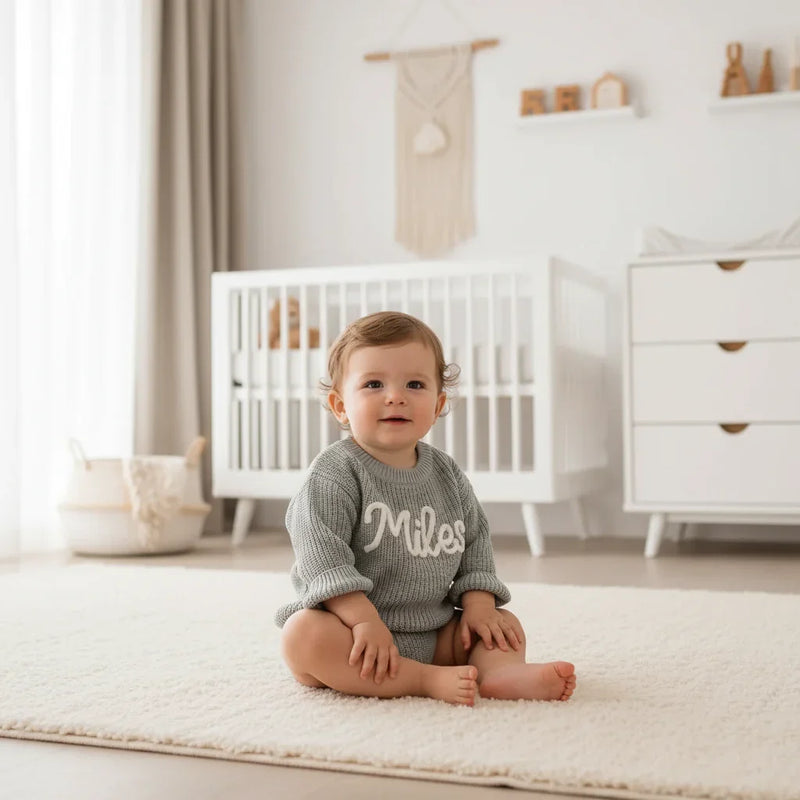 Baby boy in nursery - sitting