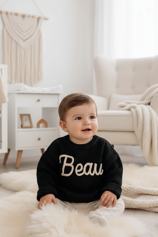 Baby boy in nursery - sitting
