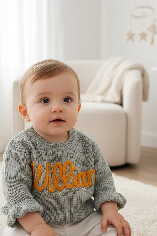 Baby boy in nursery - sitting