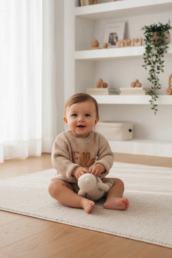 Baby boy in nursery - with toys