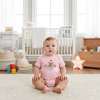 Baby boy in pink onesie - front view in nursery