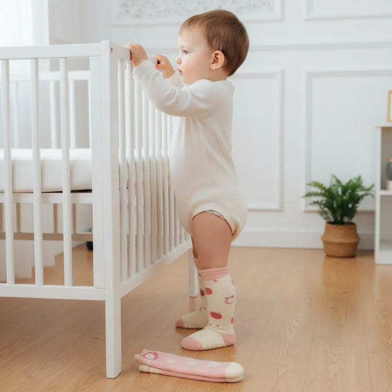 Baby boy side view standing