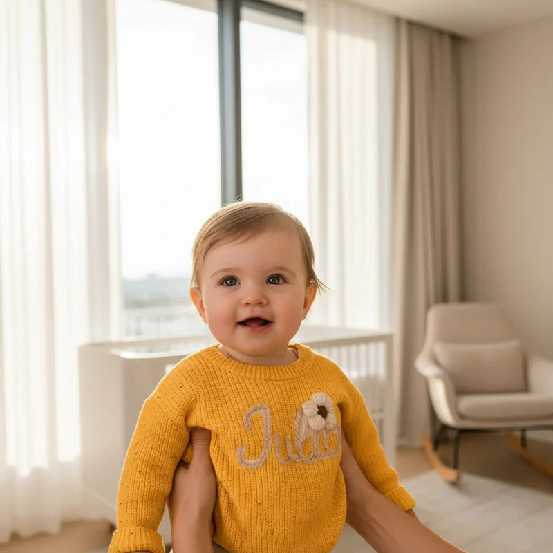 Baby girl in nursery - near window