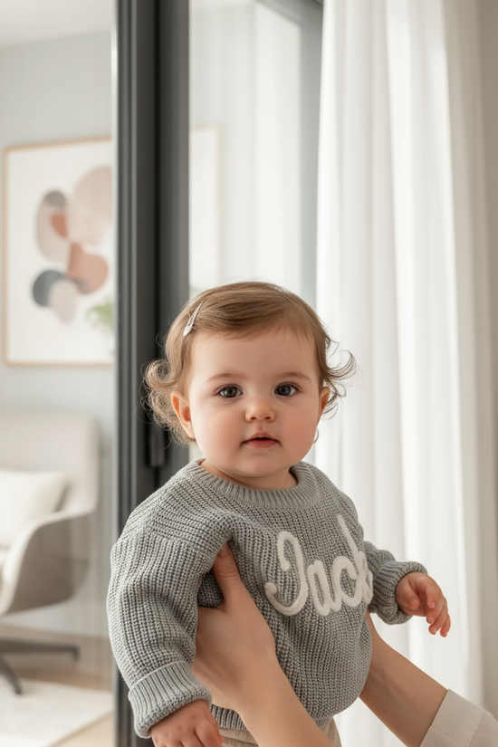 Baby girl in nursery - near window
