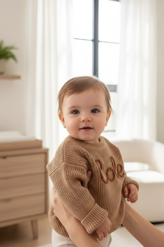 Baby girl in nursery - near window