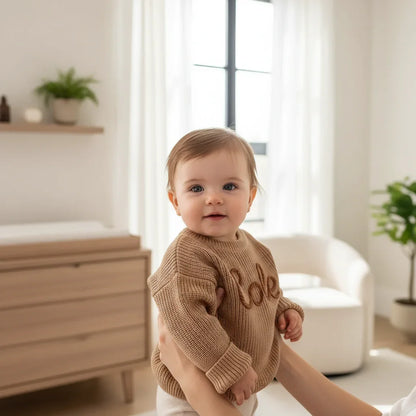 Baby girl in nursery - near window