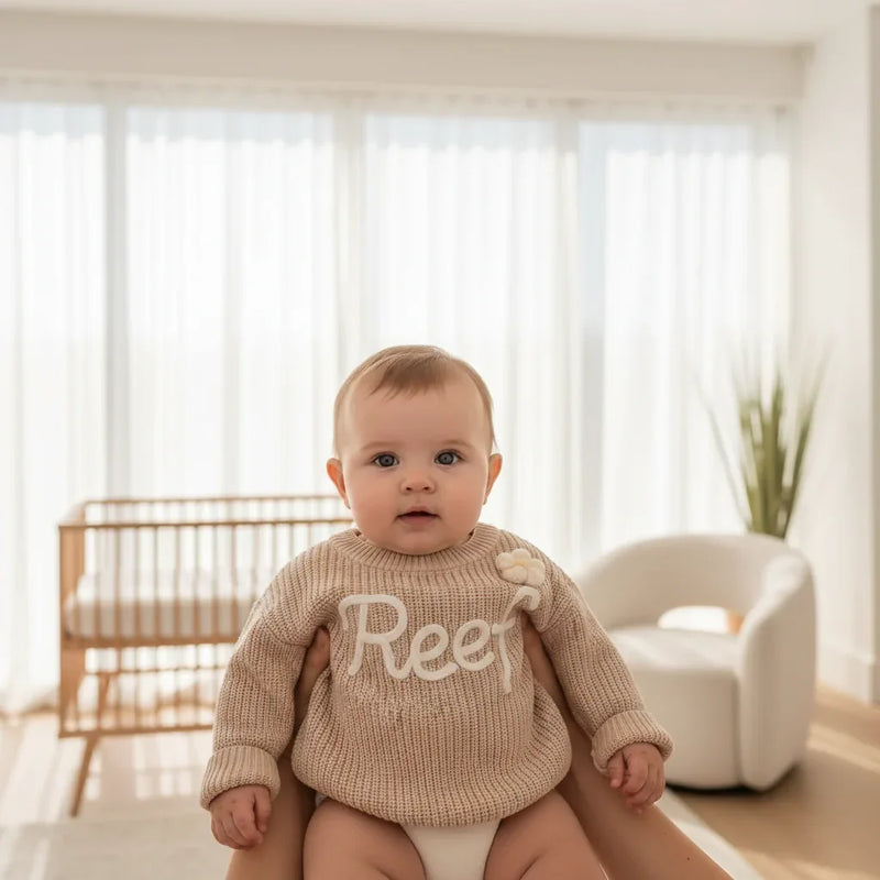 Baby girl in nursery - near window