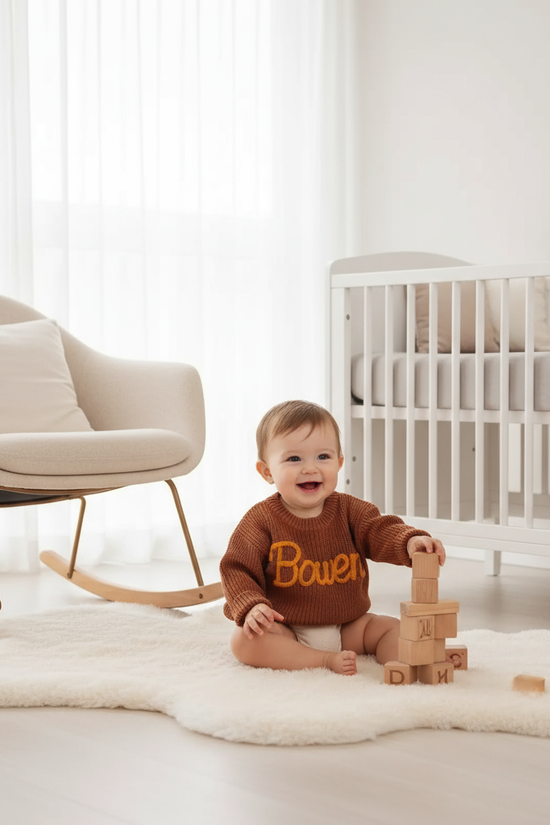 Baby girl in nursery - playing