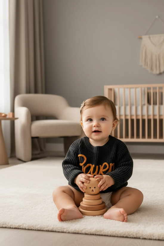 Baby girl in nursery - playing