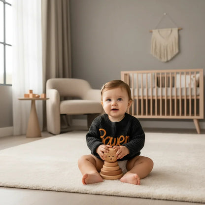 Baby girl in nursery - playing