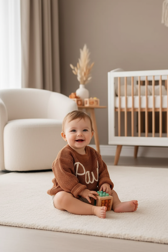 Baby girl in nursery - playing
