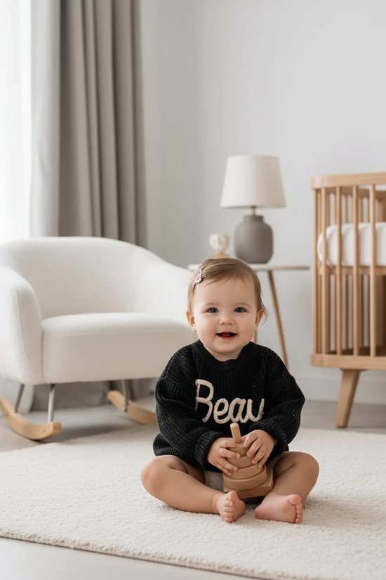Baby girl in nursery - playing