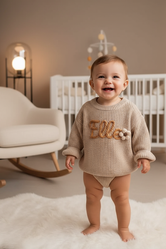 Baby girl in nursery - standing