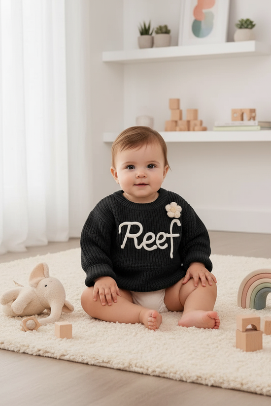 Baby girl in nursery - with toys