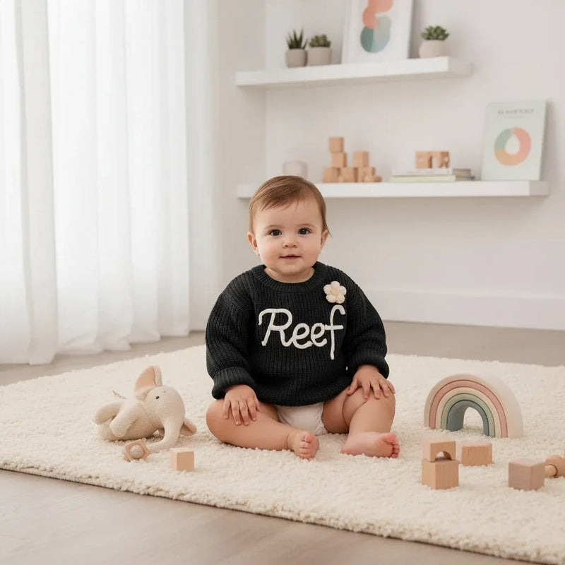 Baby girl in nursery - with toys
