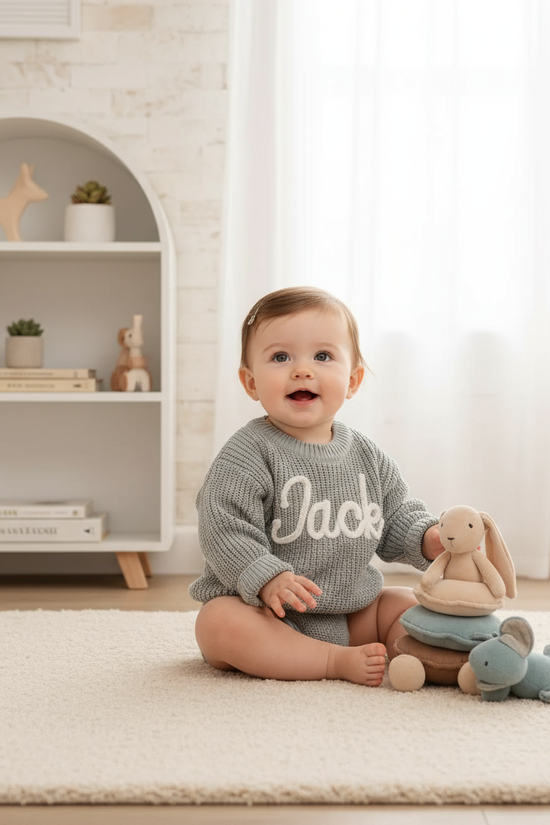 Baby girl in nursery - with toys
