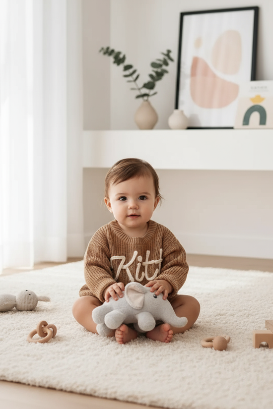 Baby girl in nursery - with toys