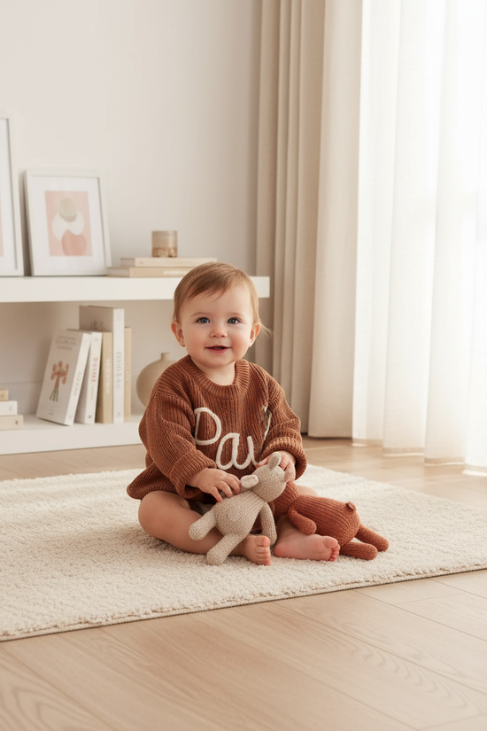 Baby girl in nursery - with toys