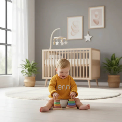 Baby girl playing in nursery