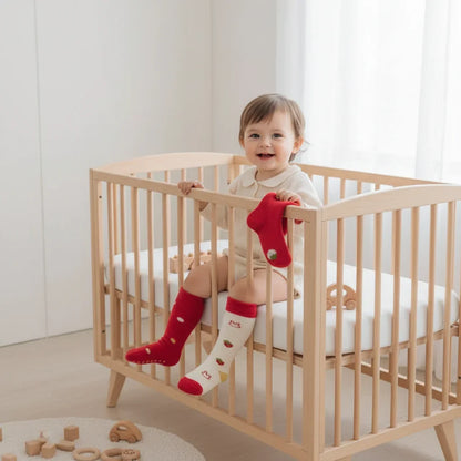 Baby girl playing with toys