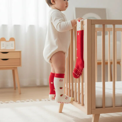 Baby girl side view standing