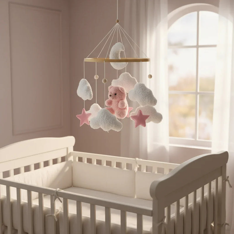 Baby mobile above crib - evening light
