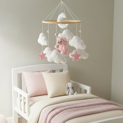 Baby mobile above toddler bed - close-up