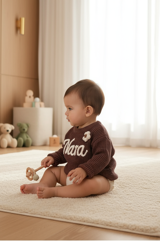 Baby side profile playing