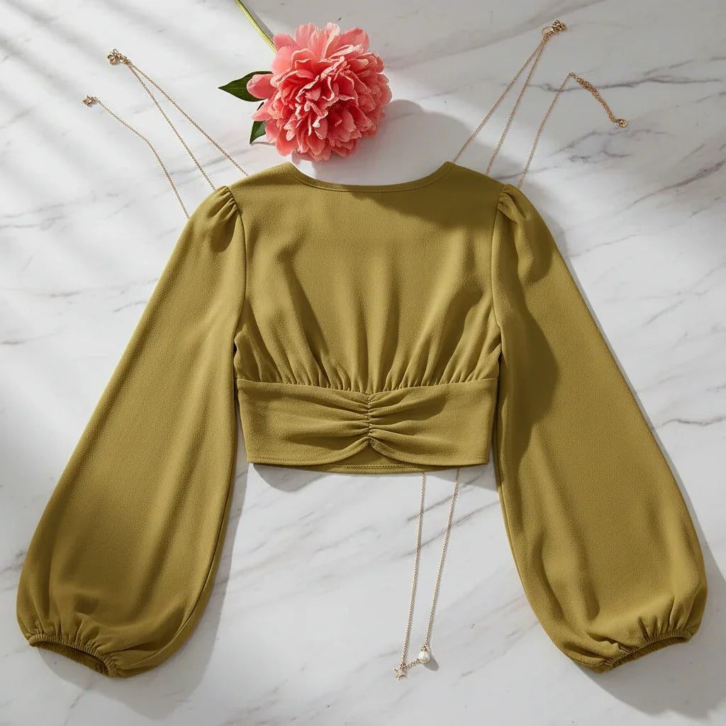 Back view on marble with gold chains and coral peony