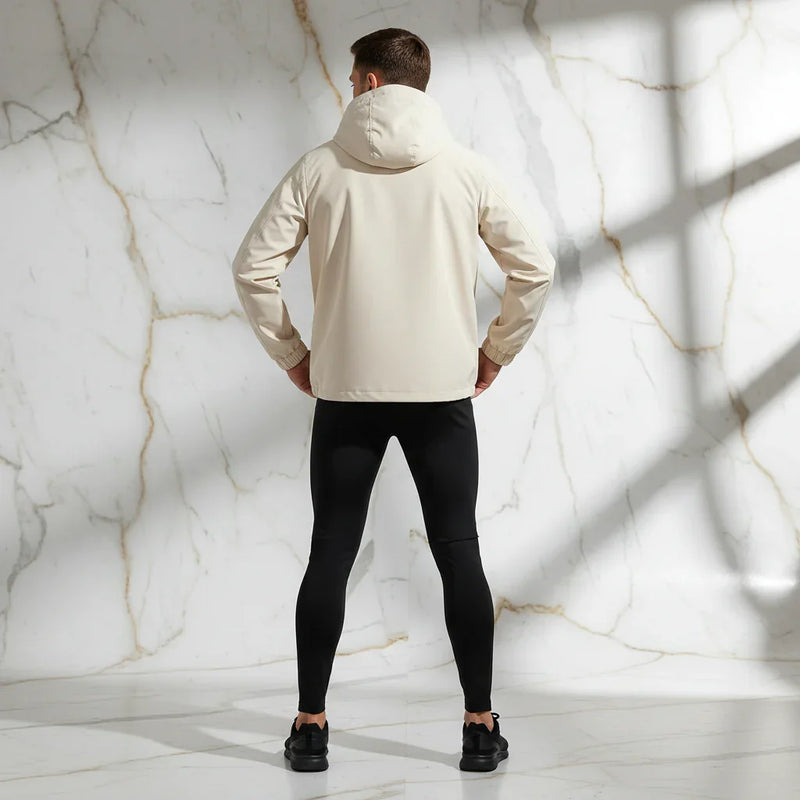 Back view - sporty man in off-white jacket