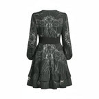 Back view of a black long sleeve dress with white abstract pattern, sold at Ivorynn