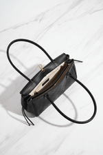 Bag open top view on marble background