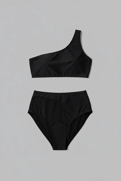 Black swimsuit flat lay