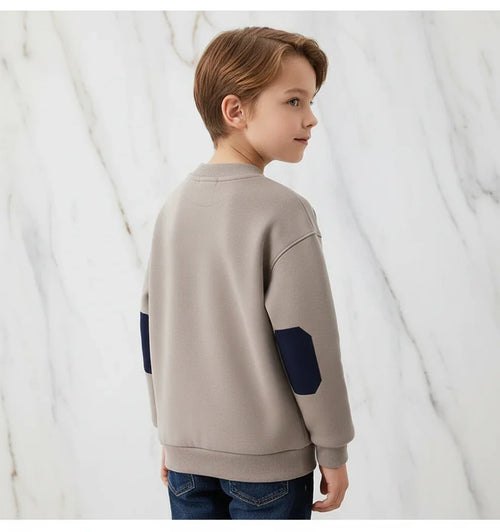 Boy back view with head turned