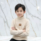 Boy Cream Seated Arms Crossed