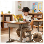 Boy reading at desk
