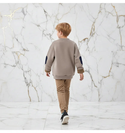 Boy walking away showing movement
