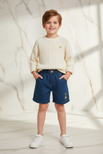 Boy wearing denim shorts - front view