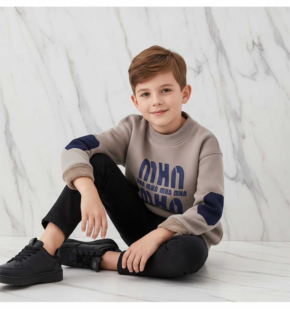 Boy wearing sweater - seated pose