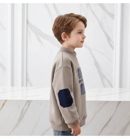 Boy wearing sweater - side profile