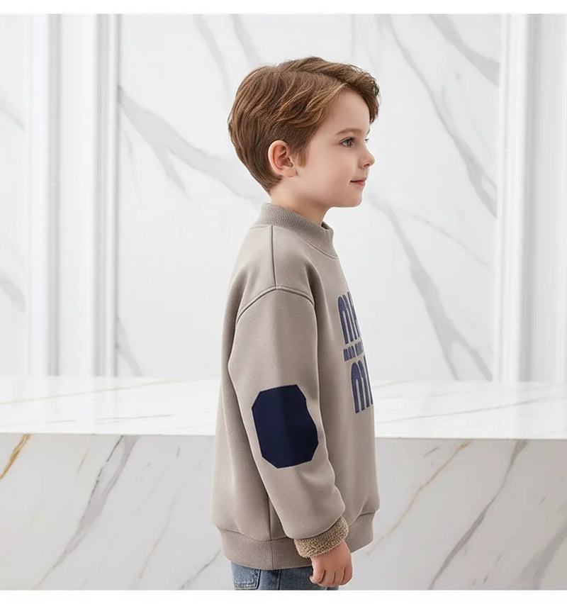 Boy wearing sweater - side profile